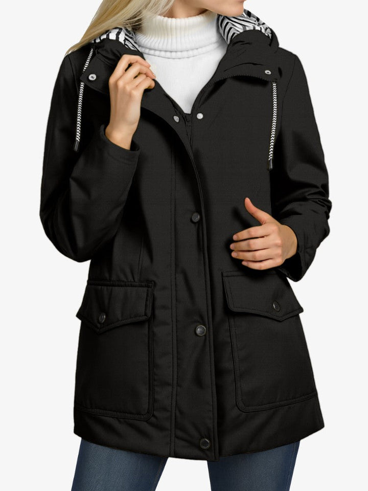 Imperméable coupe-vent pour femme avec capuche ajustable - Veste de mi-saison légère avec détails réfléchissants 0